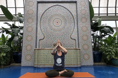 Yoga Instructor posing in front of Moroccan Fountain at Garfield Park Conservatory